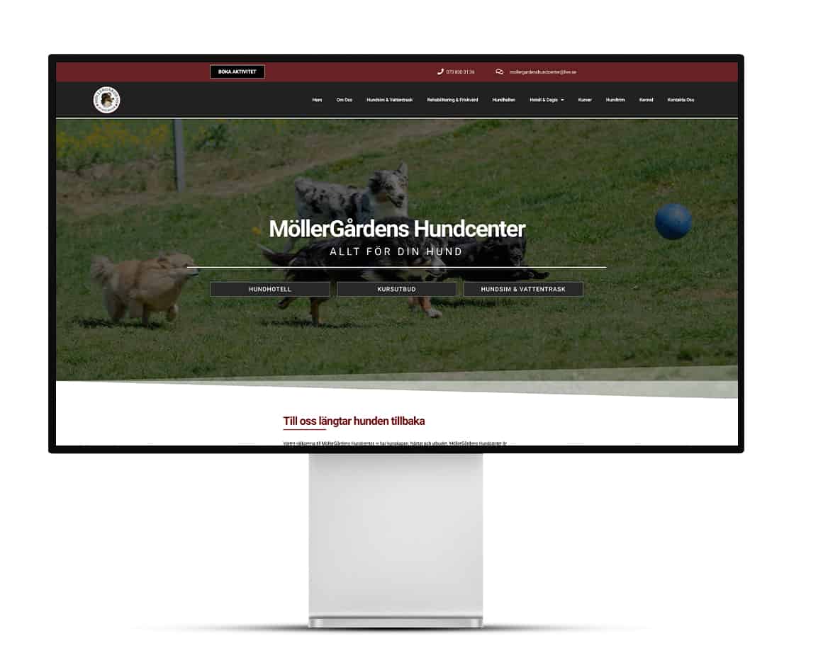 Mac-dator med MöllerGårdens webbplats